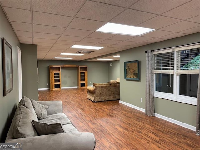 1464 Chatsworth Trce, Lawrenceville, GA 30044 - living area with wood finished floors and a paneled ceiling