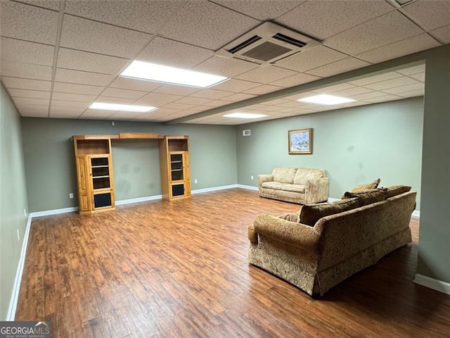 1464 Chatsworth Trce, Lawrenceville, GA 30044 - living area with wood finished floors and a drop ceiling