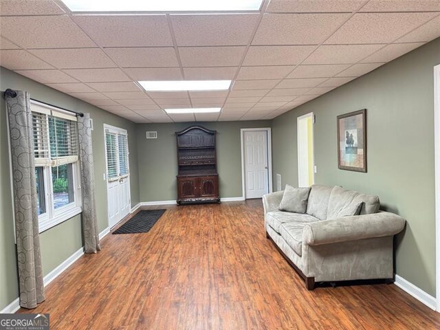 1464 Chatsworth Trce, Lawrenceville, GA 30044 - living room featuring wood finished floors and a drop ceiling