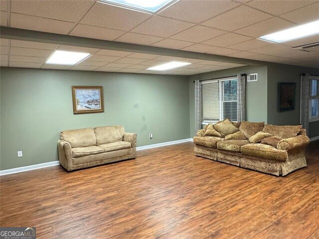 1464 Chatsworth Trce, Lawrenceville, GA 30044 - living room with wood finished floors and a drop ceiling
