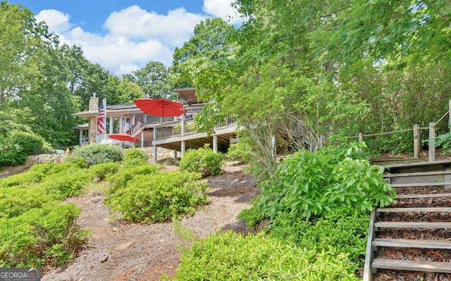212 Windjammer Dr, Hiawassee, GA 30546 - rear view of property with a wooden deck