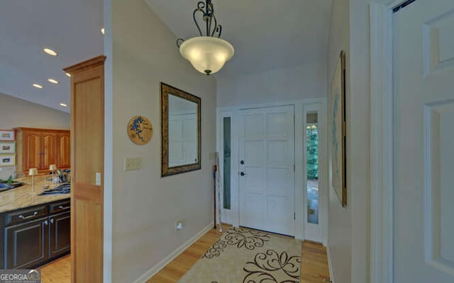 212 Windjammer Dr, Hiawassee, GA 30546 - foyer entrance featuring light wood finished floors and recessed lighting