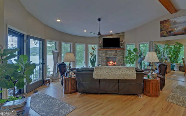 212 Windjammer Dr, Hiawassee, GA 30546 - living area featuring a ceiling fan, healthy amount of natural light, a stone fireplace, wood finished floors, and recessed lighting