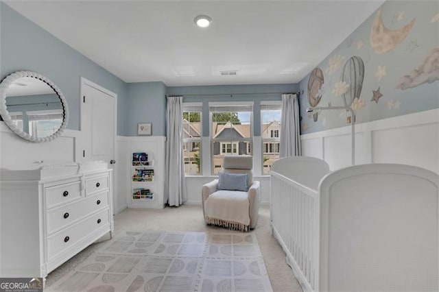 1969 Lanier Harbor Pt, Buford, GA 30518 - living area with wainscoting, a decorative wall, and light colored carpet