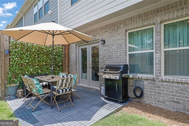1969 Lanier Harbor Pt, Buford, GA 30518 - view of patio / terrace featuring area for grilling, french doors, and outdoor dining area