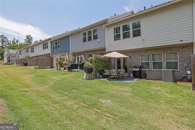 1969 Lanier Harbor Pt, Buford, GA 30518 - rear view of property with a patio and brick siding