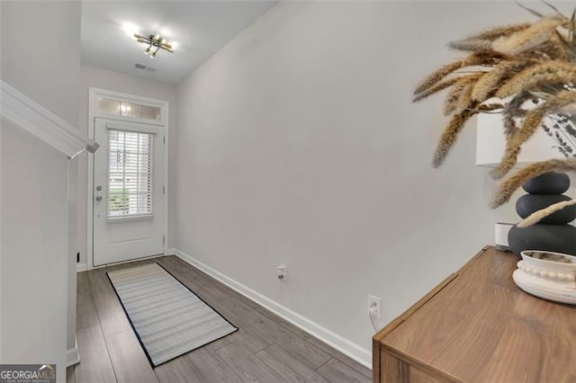 1969 Lanier Harbor Pt, Buford, GA 30518 - entryway with baseboards and wood finished floors