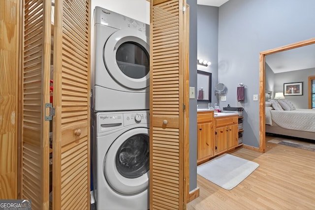 191 Deer Run Rd, Blairsville, GA 30512 - laundry room with stacked washer / drying machine and light wood-type flooring