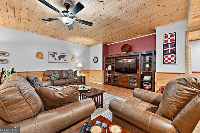 191 Deer Run Rd, Blairsville, GA 30512 - living area featuring wood ceiling, wood finished floors, a ceiling fan, wainscoting, and ornamental molding