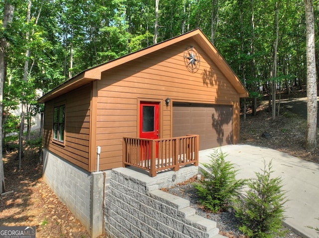191 Deer Run Rd, Blairsville, GA 30512 - rustic home with a detached garage and an outbuilding