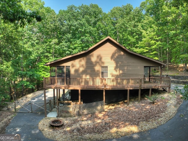 191 Deer Run Rd, Blairsville, GA 30512 - view of home's exterior with a wooden deck, a gate, and a wooded view