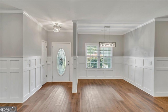 605 Live Oak Way, Dublin, GA 31021 - entrance foyer featuring a decorative wall, wood finished floors, wainscoting, and ornamental molding