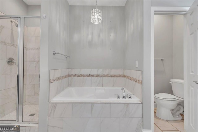 605 Live Oak Way, Dublin, GA 31021 - full bath featuring a bath, a stall shower, and tile patterned flooring