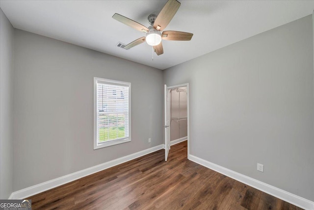 605 Live Oak Way, Dublin, GA 31021 - unfurnished room with dark wood-style flooring and a ceiling fan