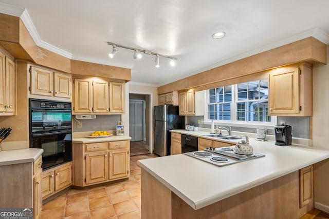 747 Channing Dr NW, Atlanta, GA 30318 - kitchen featuring black appliances, a peninsula, light countertops, light brown cabinetry, and crown molding