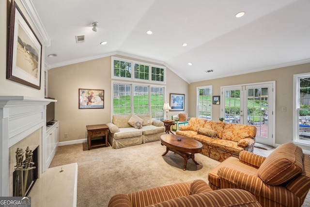 747 Channing Dr NW, Atlanta, GA 30318 - living room featuring a high end fireplace, vaulted ceiling, light carpet, recessed lighting, and crown molding