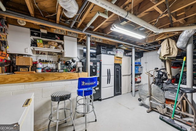 747 Channing Dr NW, Atlanta, GA 30318 - unfinished below grade area featuring a workshop area