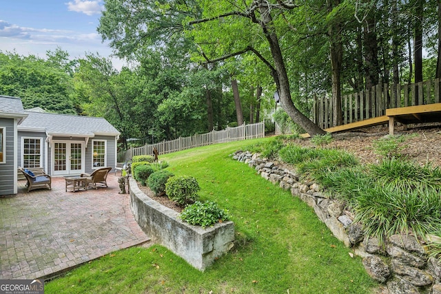 747 Channing Dr NW, Atlanta, GA 30318 - view of yard featuring french doors and a patio area