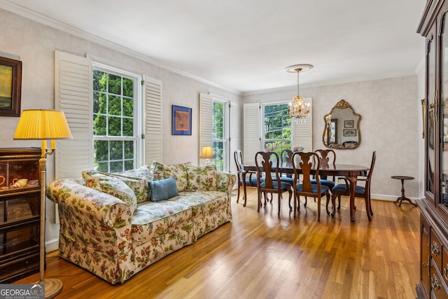 747 Channing Dr NW, Atlanta, GA 30318 - living room with hardwood / wood-style floors, a chandelier, and crown molding