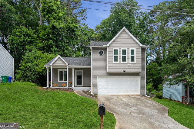 2069 Countydown Ln, Stone Mountain, GA 30088 - view of front facade featuring concrete driveway, a porch, an attached garage, and a front yard