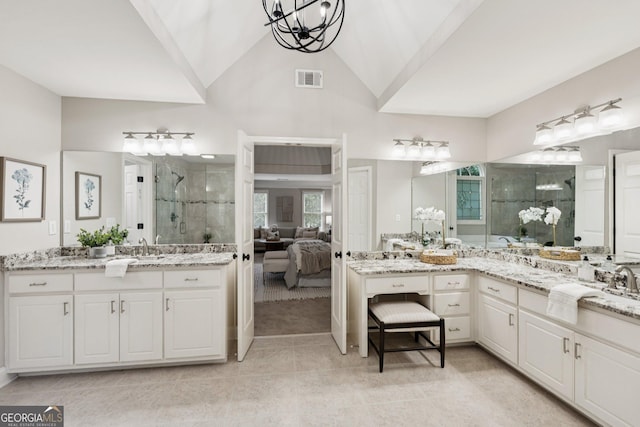 665 Greenview Ter, Milton, GA 30004 - bathroom featuring a shower stall, ensuite bath, tile patterned floors, two vanities, and a chandelier