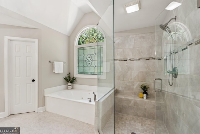 665 Greenview Ter, Milton, GA 30004 - full bathroom with a stall shower, a garden tub, lofted ceiling, and tile patterned floors