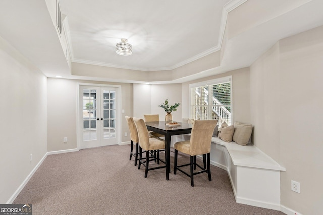 665 Greenview Ter, Milton, GA 30004 - carpeted dining room featuring french doors, ornamental molding, and a raised ceiling
