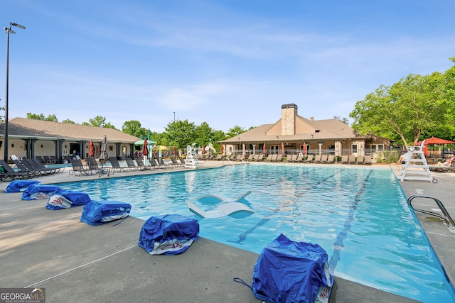 665 Greenview Ter, Milton, GA 30004 - community pool featuring a patio
