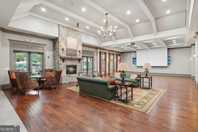 665 Greenview Ter, Milton, GA 30004 - living room with a fireplace, plenty of natural light, hardwood / wood-style flooring, a chandelier, and recessed lighting