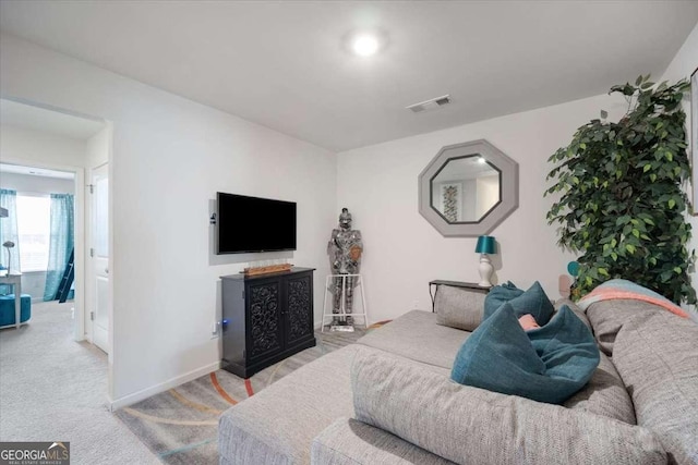 2404 Fitts Dr, Conyers, GA 30094 - bedroom featuring light colored carpet and baseboards