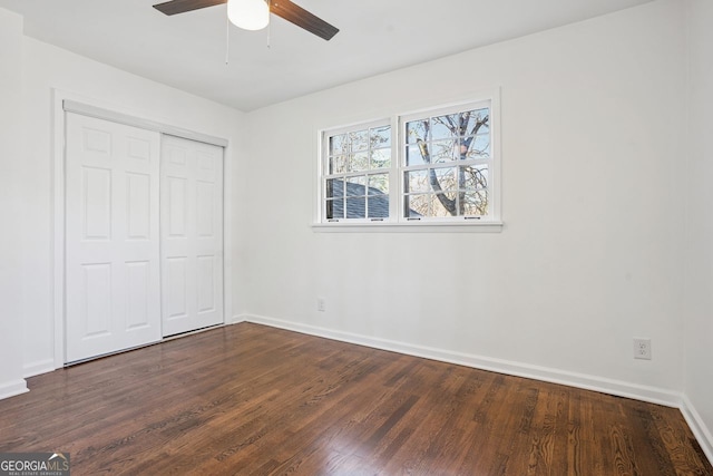 335 Amberidge, Atlanta, GA 30328 - unfurnished bedroom with wood finished floors, a closet, and a ceiling fan