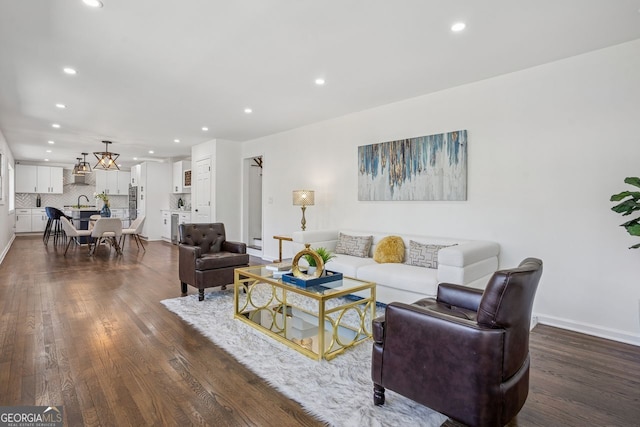 335 Amberidge, Atlanta, GA 30328 - living room with recessed lighting and dark wood-style flooring
