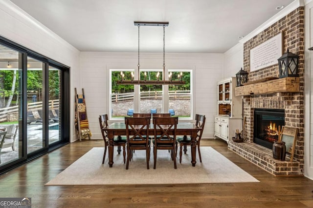 6326 Point Twenty Two, Gainesville, GA 30506 - dining space featuring dark wood-type flooring and a fireplace