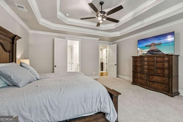 6326 Point Twenty Two, Gainesville, GA 30506 - carpeted bedroom with a tray ceiling, ornamental molding, and a ceiling fan