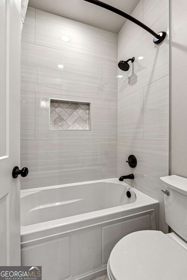 6326 Point Twenty Two, Gainesville, GA 30506 - bathroom featuring toilet and shower / tub combination