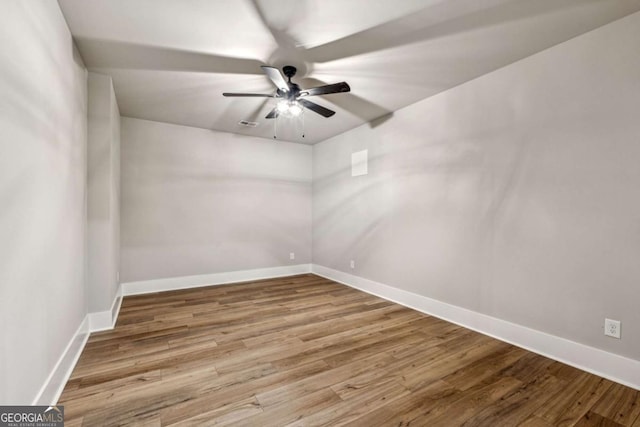 6326 Point Twenty Two, Gainesville, GA 30506 - empty room featuring wood finished floors and a ceiling fan