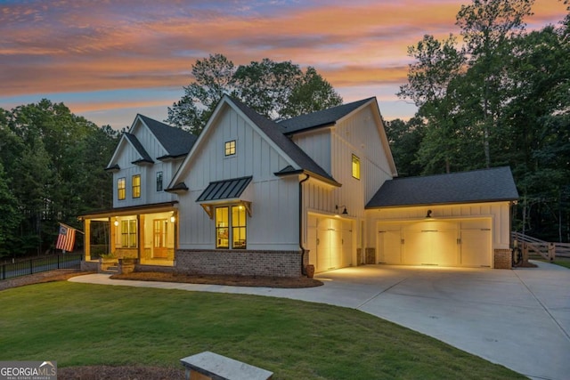 6326 Point Twenty Two, Gainesville, GA 30506 - modern farmhouse style home featuring board and batten siding, a garage, concrete driveway, and a standing seam roof