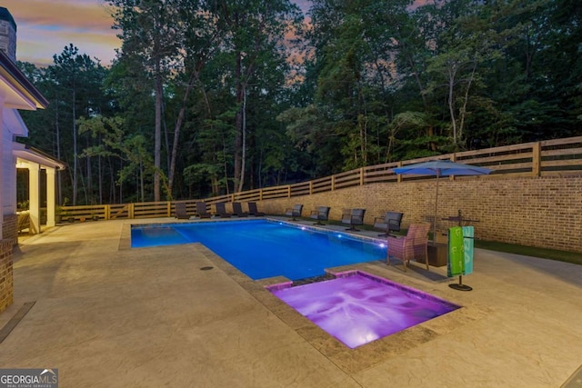 6326 Point Twenty Two, Gainesville, GA 30506 - view of pool featuring a patio, a fenced backyard, a pool with connected hot tub, and a wooded view