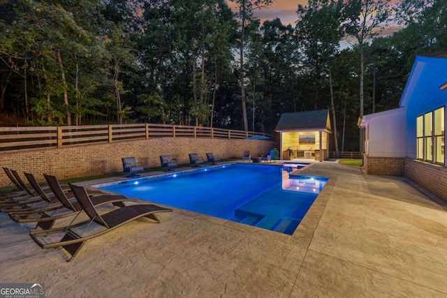 6326 Point Twenty Two, Gainesville, GA 30506 - view of swimming pool with a patio, a fenced backyard, and an outbuilding