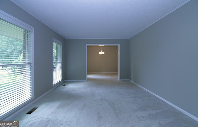 350 Laurel Ln, Lagrange, GA 30241 - carpeted empty room featuring a chandelier and crown molding