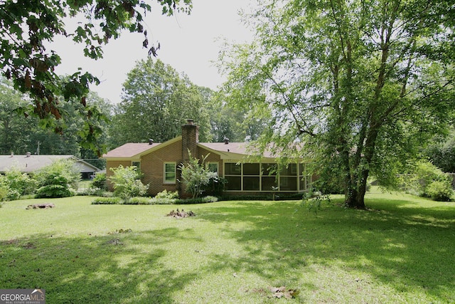 350 Laurel Ln, Lagrange, GA 30241 - view of green lawn with a sunroom