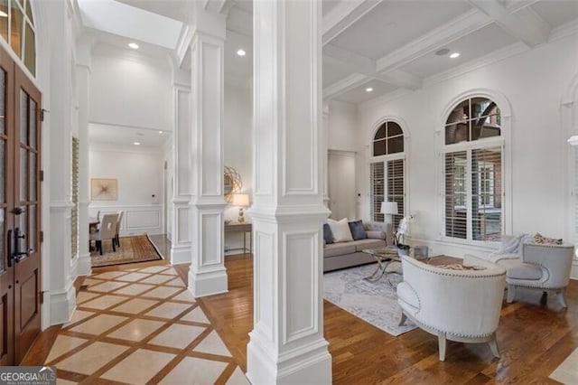4634 Whitestone Way, Suwanee, GA 30024 - foyer entrance with ornate columns, a towering ceiling, a decorative wall, beam ceiling, and recessed lighting
