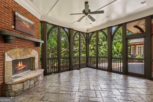 4634 Whitestone Way, Suwanee, GA 30024 - unfurnished sunroom featuring a fireplace and ceiling fan