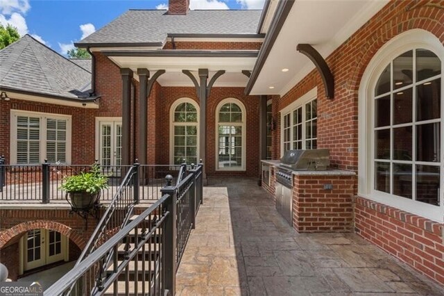 4634 Whitestone Way, Suwanee, GA 30024 - view of patio / terrace with an outdoor kitchen and french doors