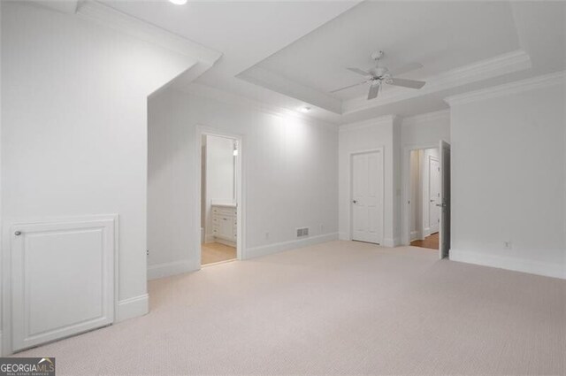 4634 Whitestone Way, Suwanee, GA 30024 - unfurnished bedroom with carpet flooring, a raised ceiling, crown molding, connected bathroom, and a ceiling fan