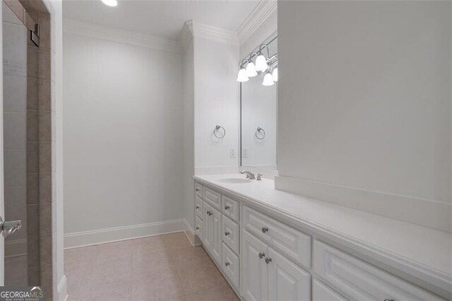 4634 Whitestone Way, Suwanee, GA 30024 - full bath with vanity, tile patterned floors, crown molding, and a tile shower