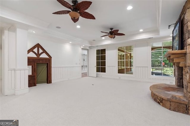 4634 Whitestone Way, Suwanee, GA 30024 - living area featuring a fireplace, a ceiling fan, carpet floors, recessed lighting, and wainscoting