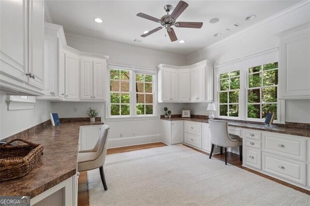 4634 Whitestone Way, Suwanee, GA 30024 - office area featuring built in desk, a ceiling fan, ornamental molding, light wood-style floors, and recessed lighting