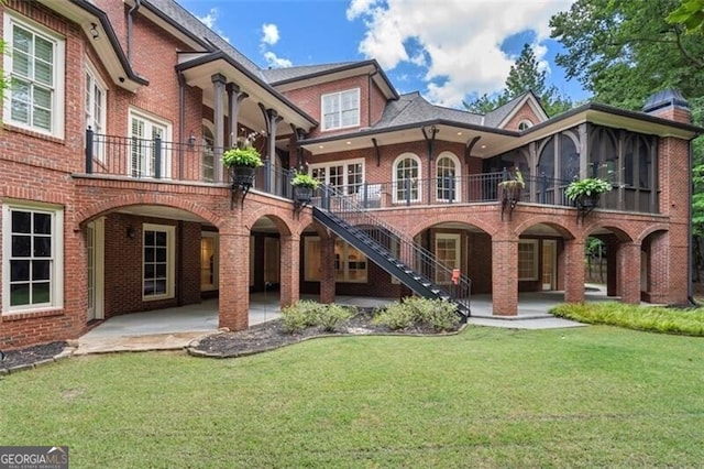 4634 Whitestone Way, Suwanee, GA 30024 - back of house featuring a patio, brick siding, and a yard