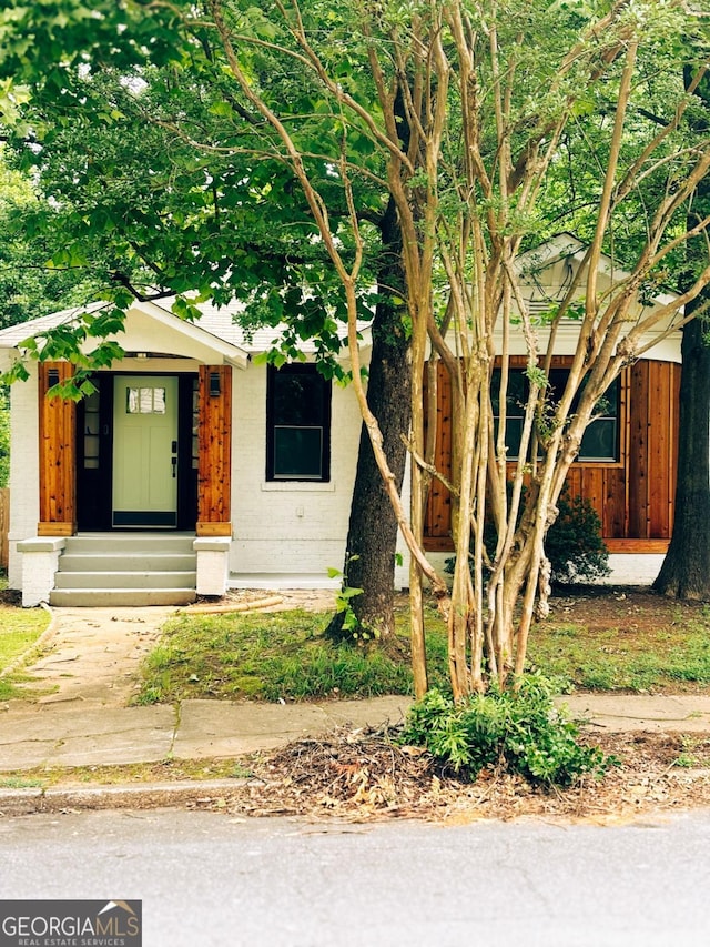 1460 Hartford Ave SW, Atlanta, GA 30310 - view of front facade with concrete block siding and entry steps